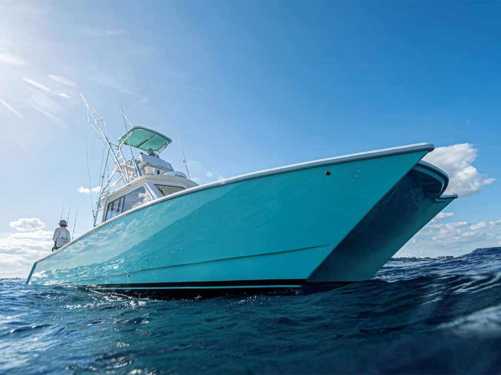 Close up detail of a sport-fishing catamaran's hull.