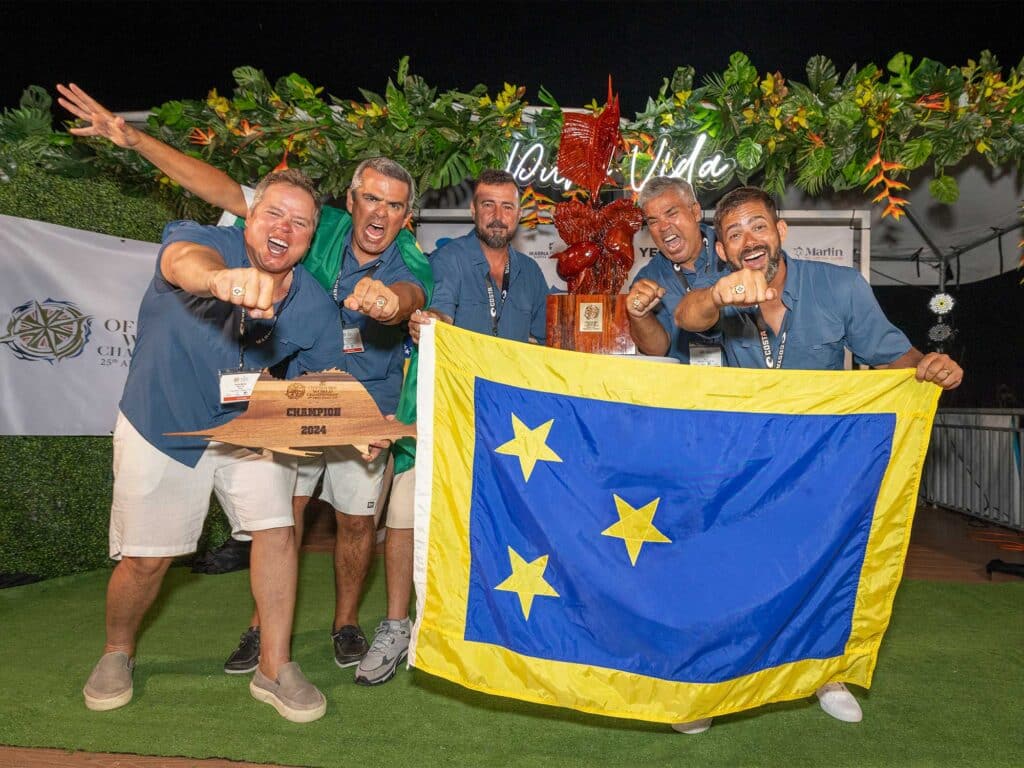 The first place team of the 2024 Costa Offshore World championship celebrating at the awards ceremony.