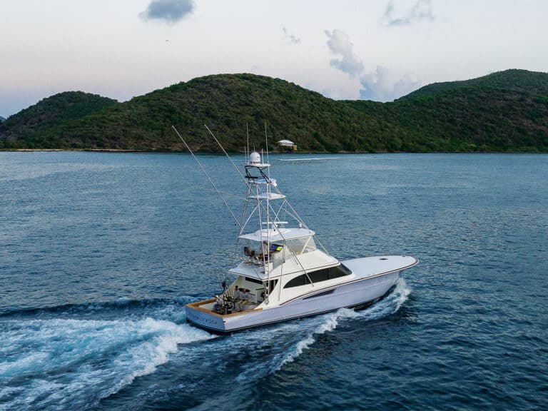 A sport-fishing boat cruising on the water around Scrub Island.