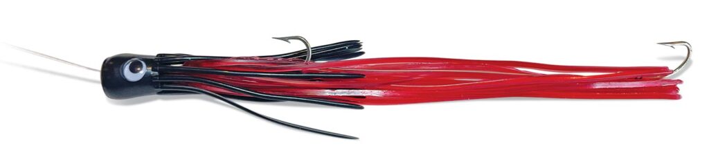 A Lil Chugger Needlefish lure on a white background.