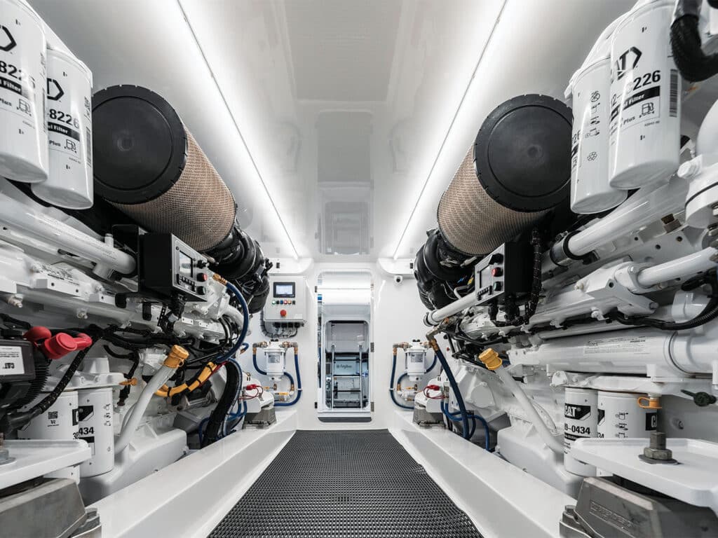The clean white engine room of the Jarrett Bay Boatworks sport-fishing boat.