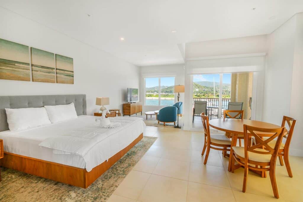 View of the Marina Flamingo bedroom with a view over the marina.