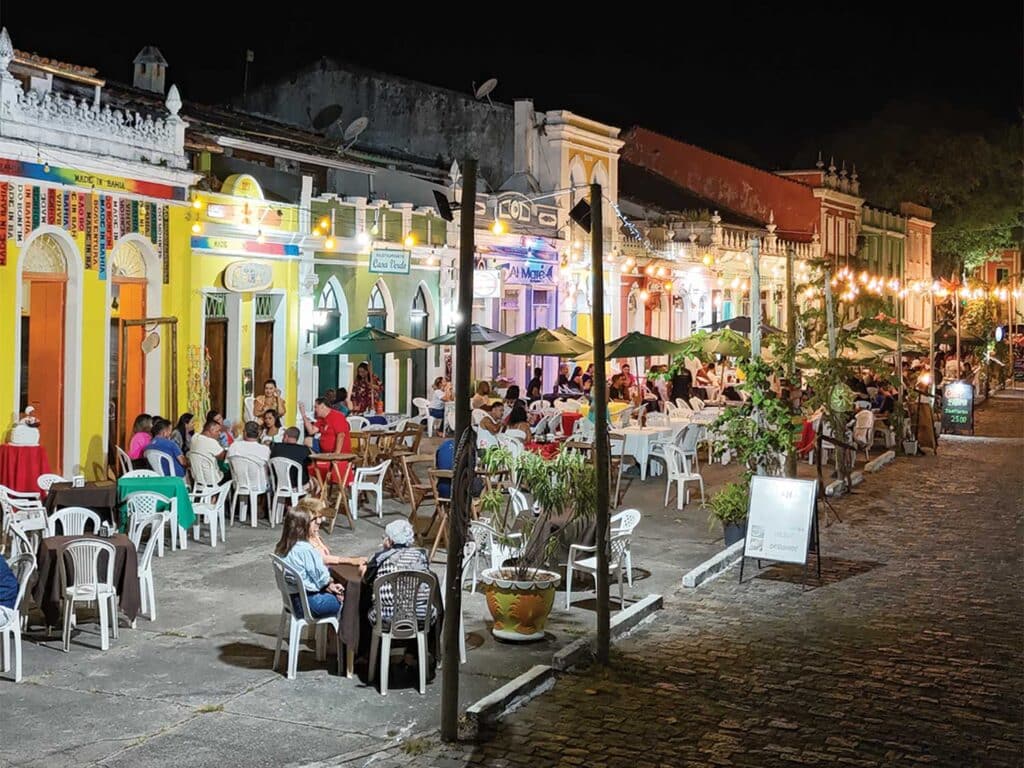 Canavieiras lit up at night time.