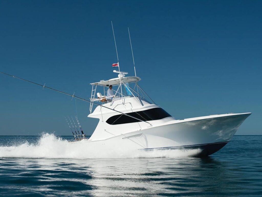 The sport-fishing boat Tijereta cruises across the ocean.