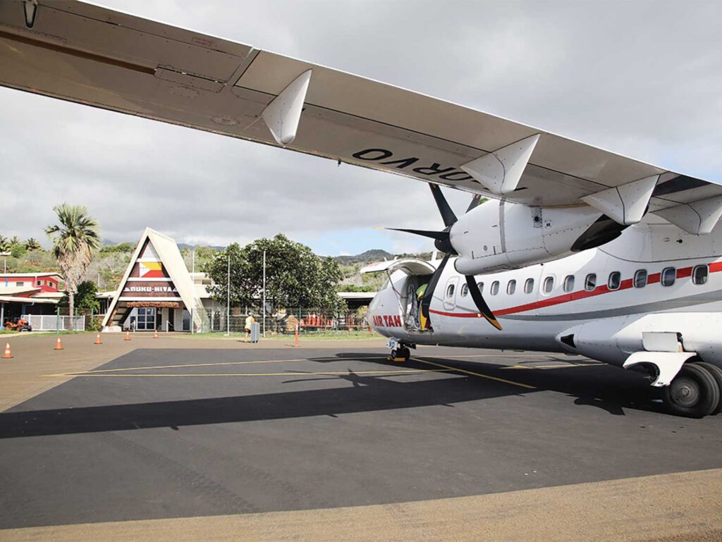 A small airplane in an airport.