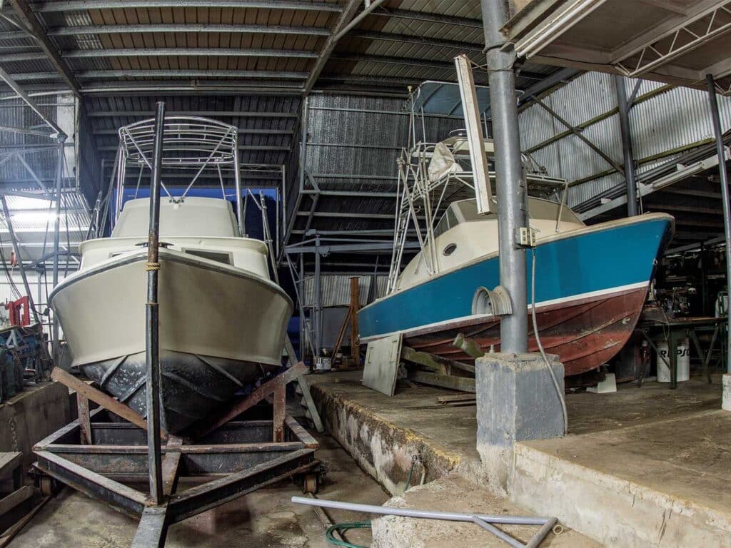 Two boats in dry dock for maintenance.