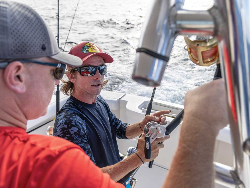 Tyler Morris instructing anglers.