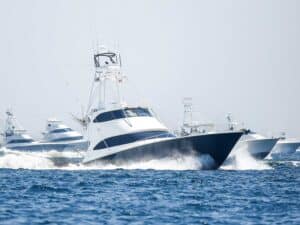 A fleet of sport-fishing boats on the water.