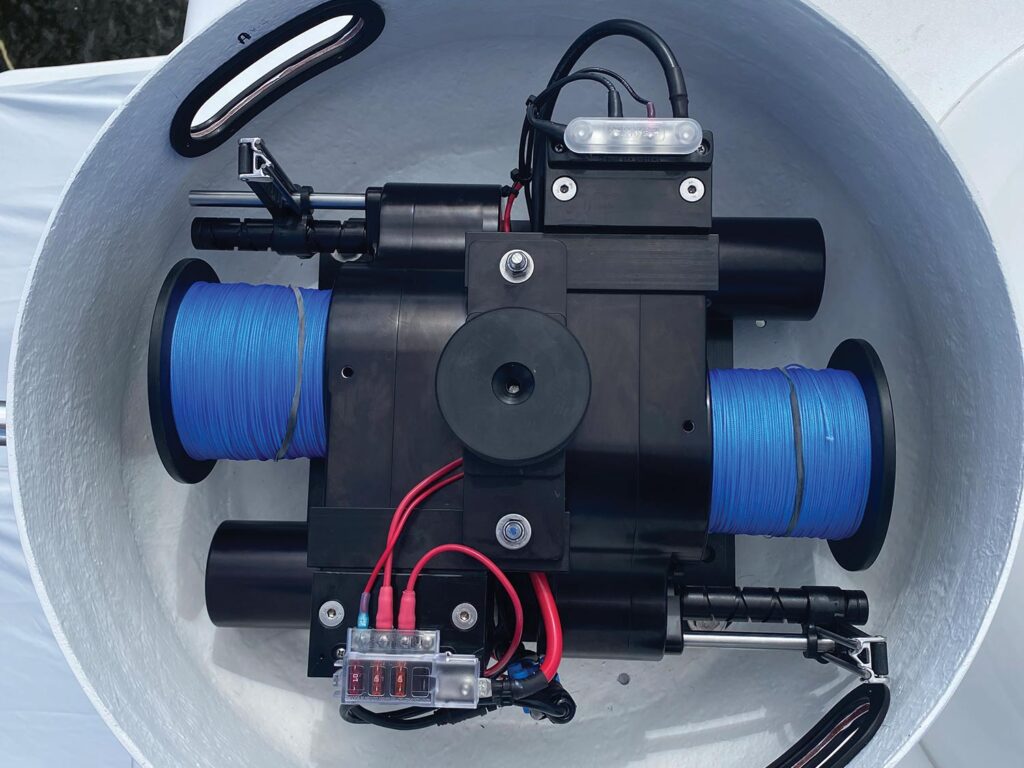 Electric fishing reel mount enclosure.