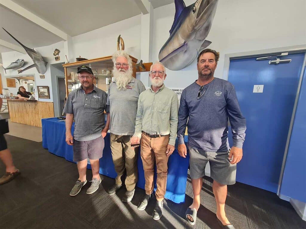 A sport-fishing team at an awards ceremony.