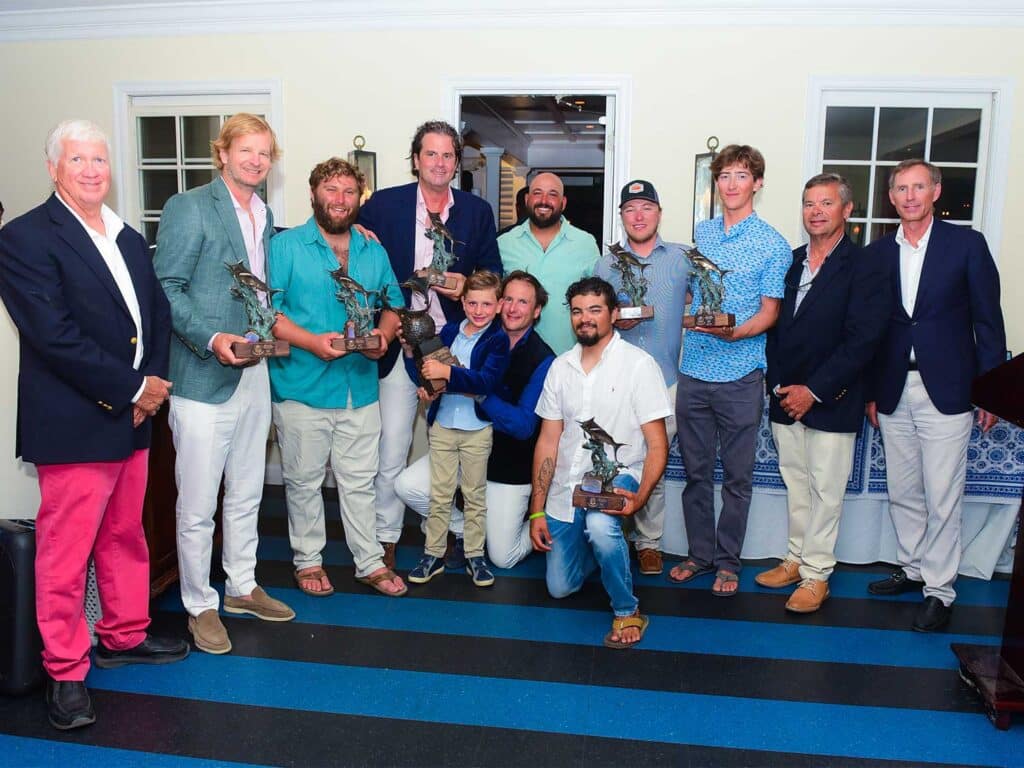 A sport-fishing team at an awards ceremony.