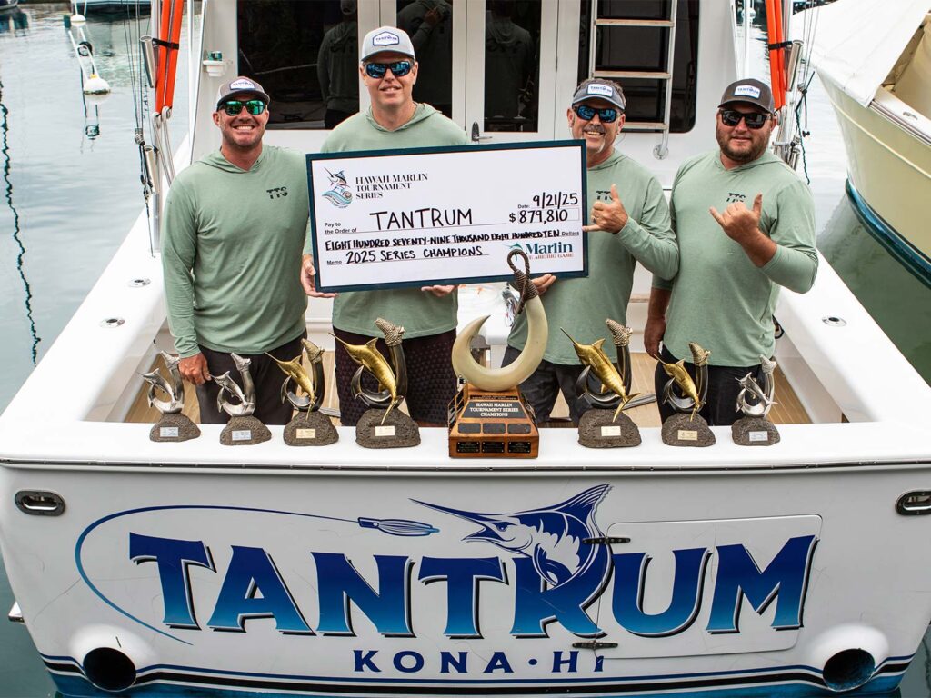 Sport-fishing team celebrating.