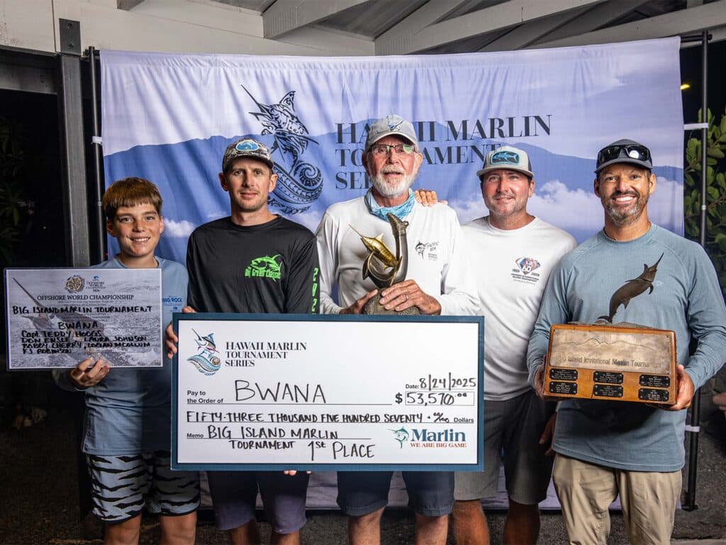 Sport-fishing team celebrating.