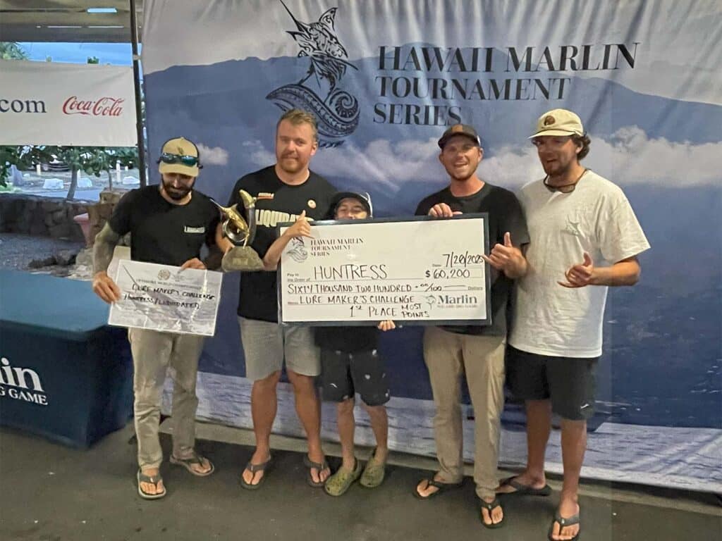 Sport-fishing team celebrating.