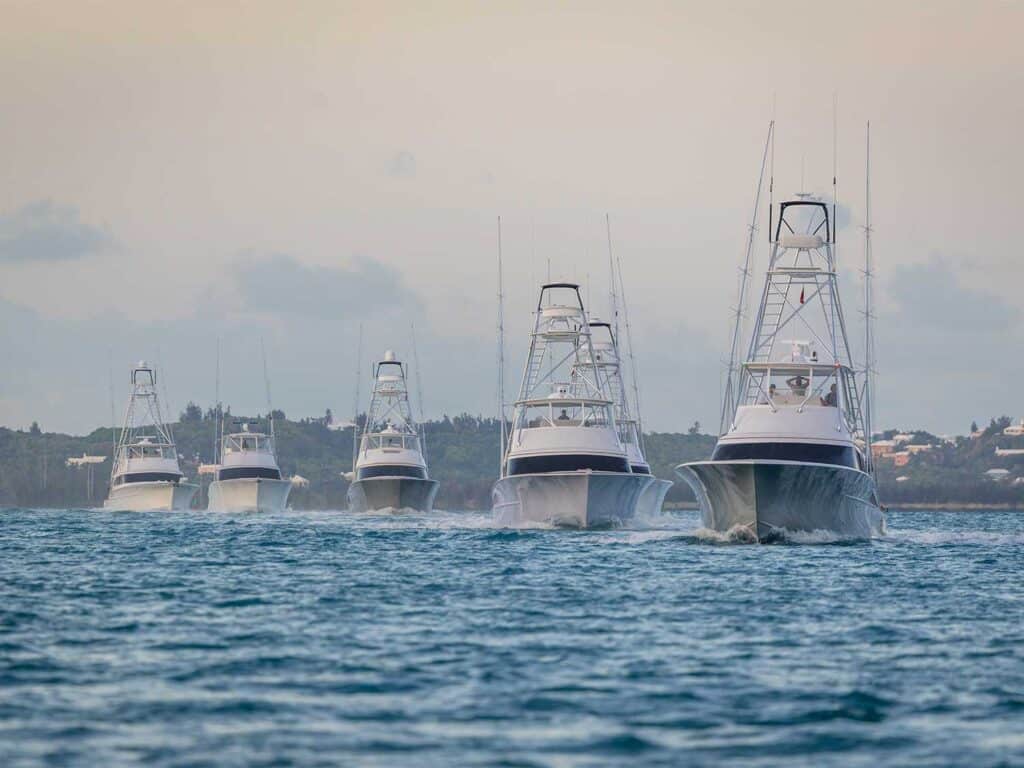 A fleet of sport-fishing boats on the blue waters of Bermuda for a day of fishing.