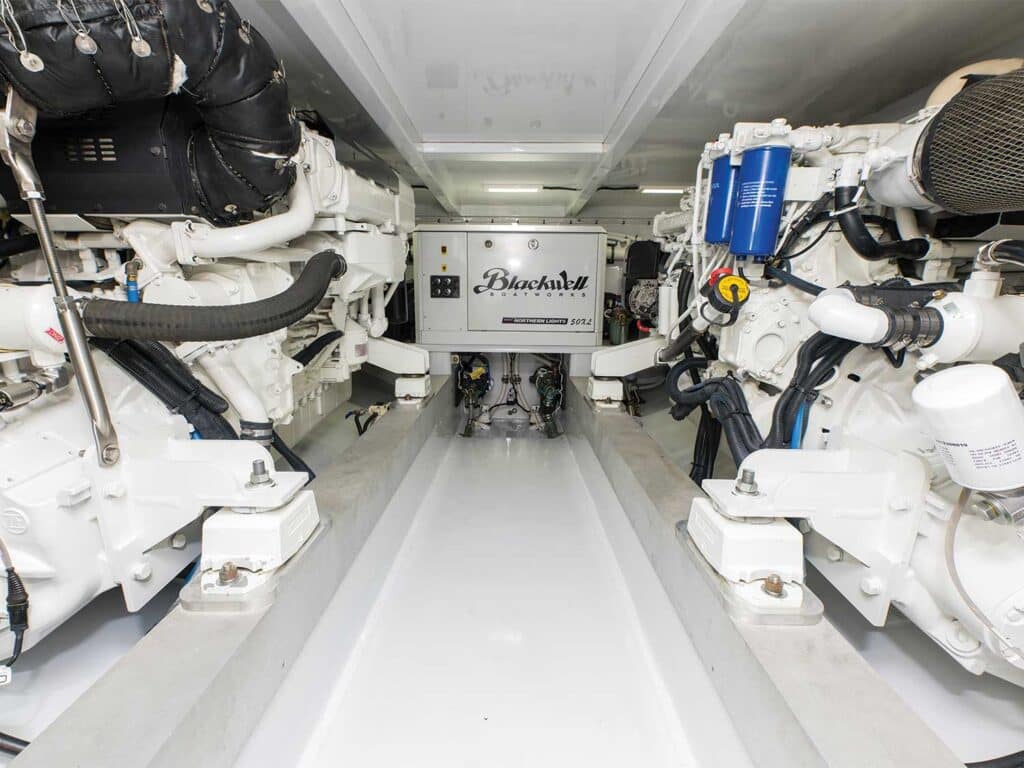 The clean, white engine room of the Blackwell Boatworks 50XL.