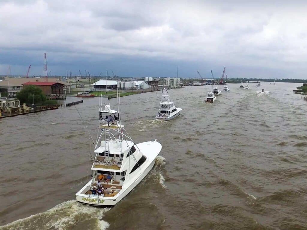 A fleet of sport-fishing boats on the water.