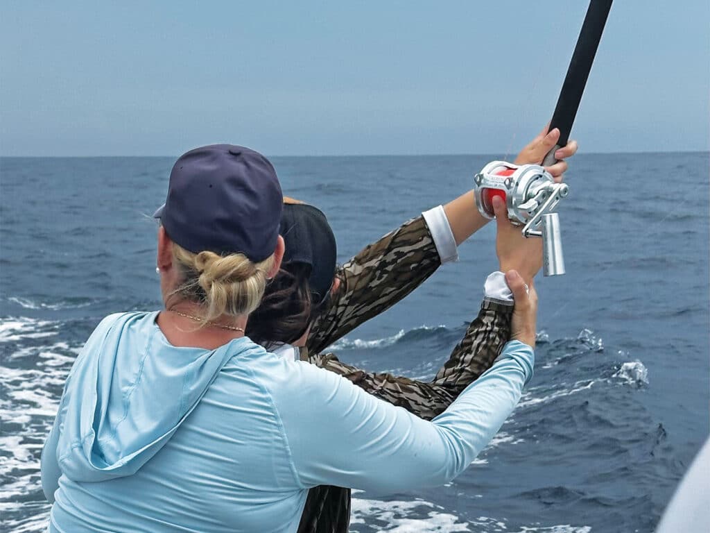 Capt. Jen Copeland instructs an angler.
