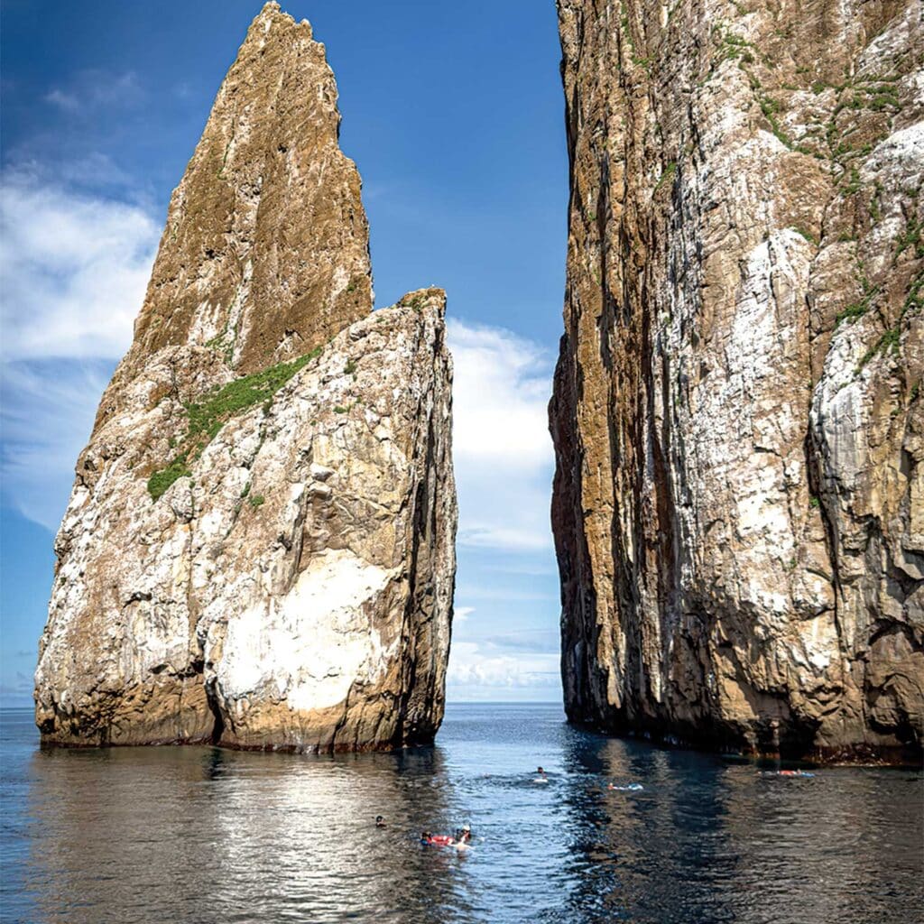 Snorkelers around Kicker Rock.