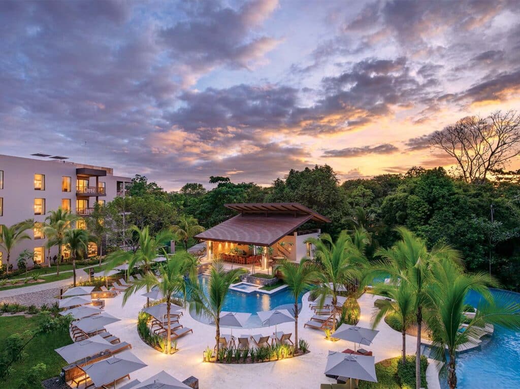 Aerial view of a resort's poolside area.