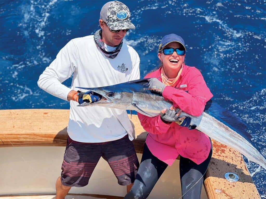 Angler poses with shortbill spearfish.