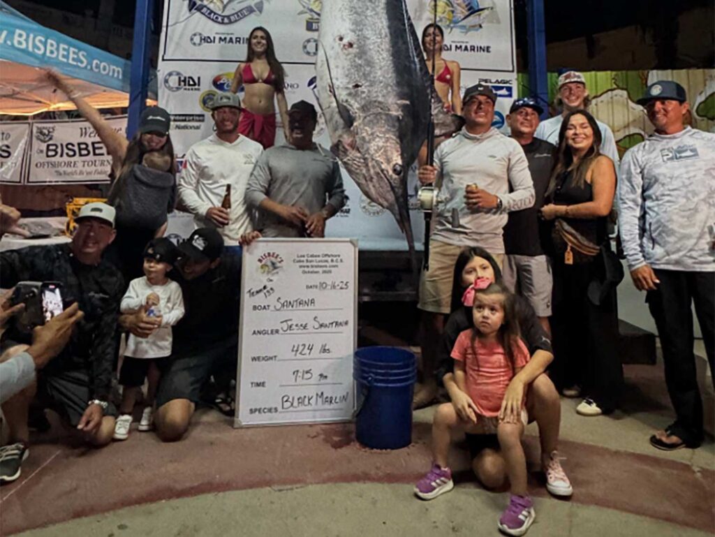 A team of anglers around a large marlin.