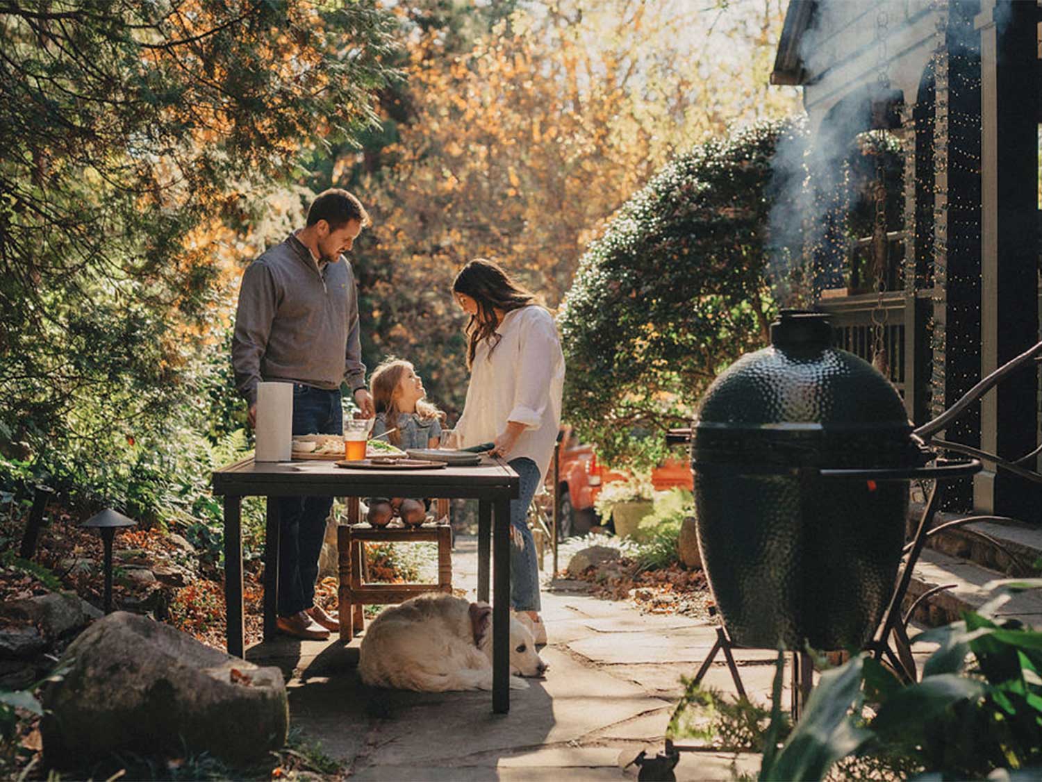 A family sharing an outdoor meal