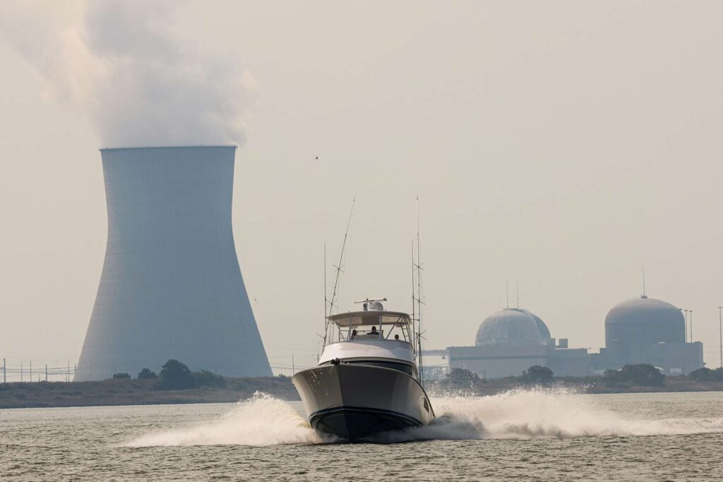 A boat cruises on the water.