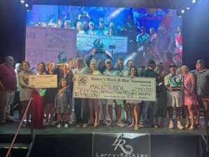 A sport-fishing team at the awards ceremony of the 2025 Bisbee's Black and Blue