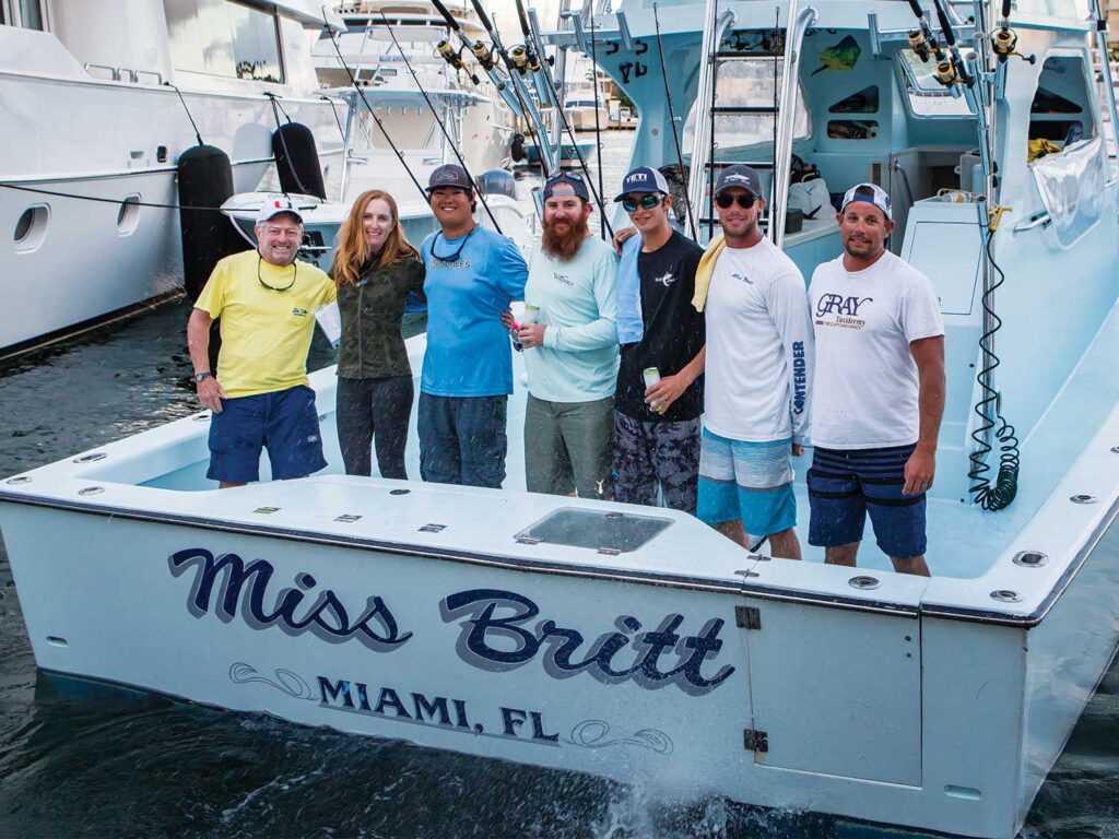Tim Choate and his daughter Stephanie aboard a sport-fishing boat with other scientists.