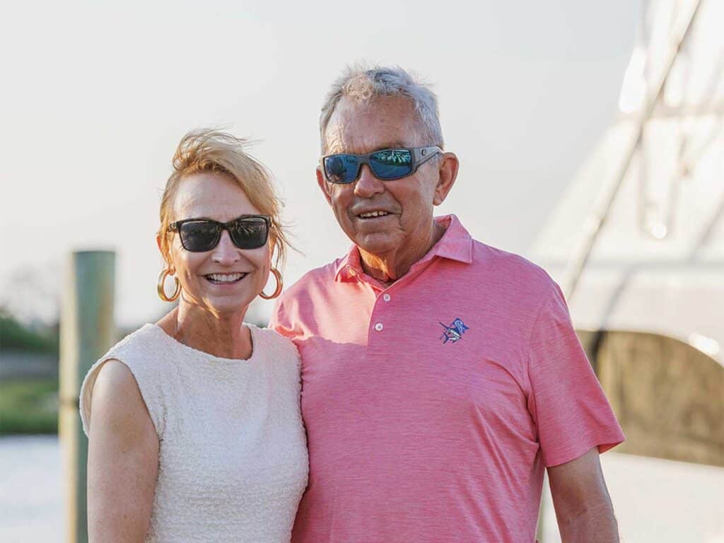 Capt. Rom Whitaker and his wife.