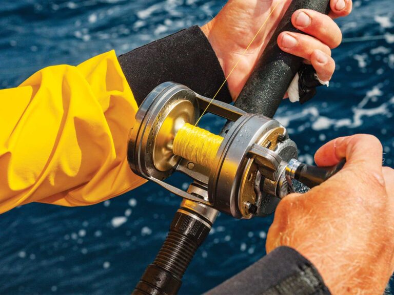 Close up of a fishing reel with braided line.