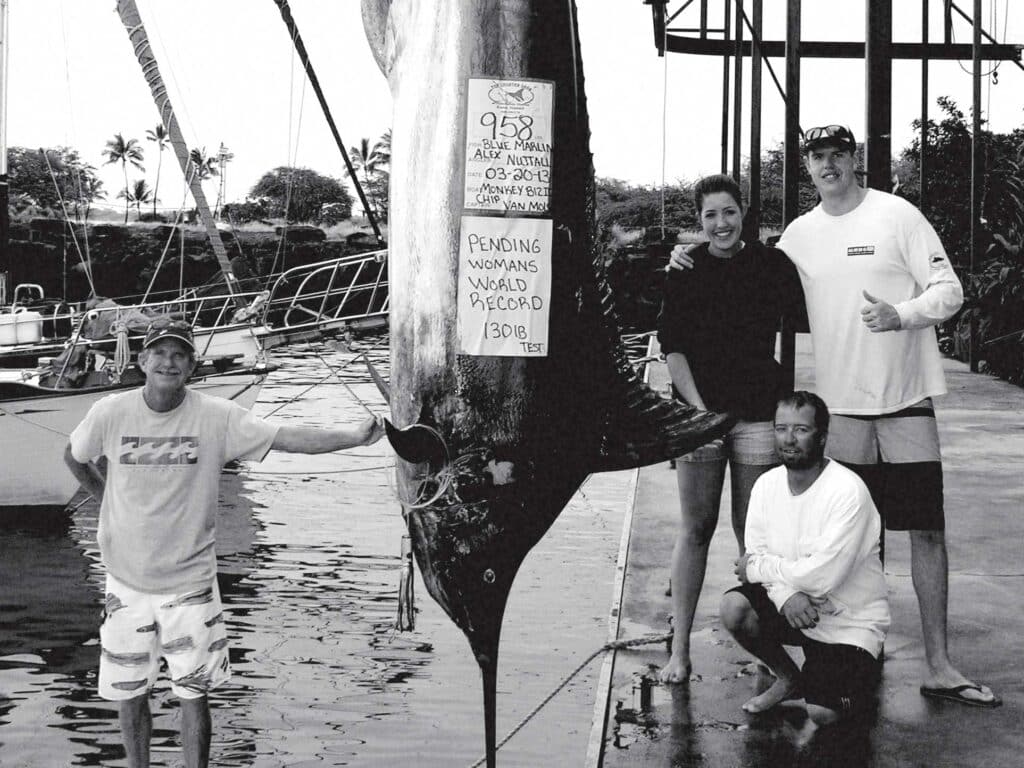 A black and white image of Alex Durham's large 958-lb marlin.
