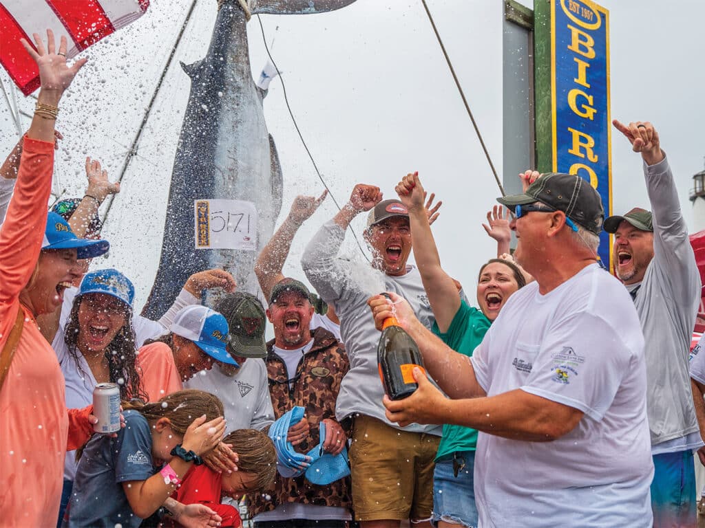 Anglers celebrating at the Big Rock Blue Marlin Tournament