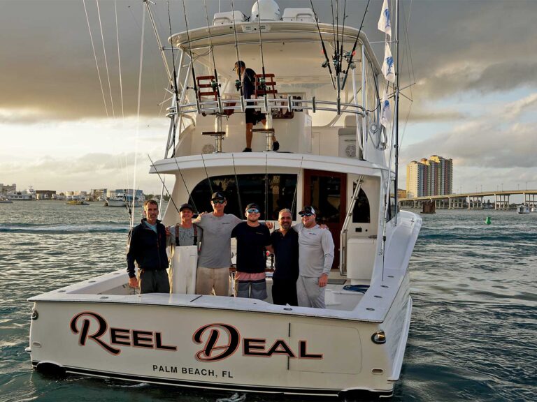 Team Reel Deal in the cockpit of their sport-fishing boat