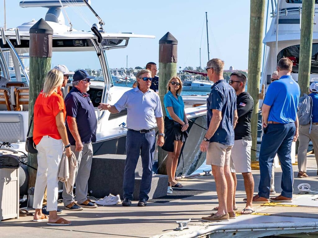 Pat Healey on the docks with several people.