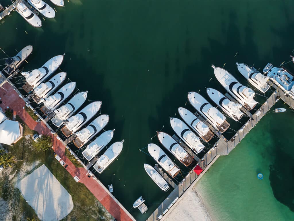 Aerial view of a sport-fishing marina with boats docked.
