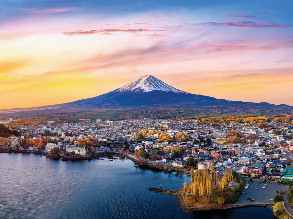 Mt. Fuji in the skyline of a Japanese port.