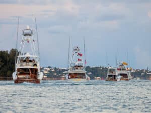 A fleet of sport-fishing boats on the water.