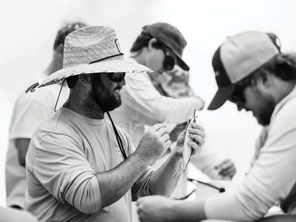 Crew rigging up bait.