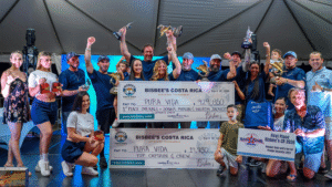 Team Pura Vida accepting the prizes and check for winning the 2026 Bisbee's Costa Offshore