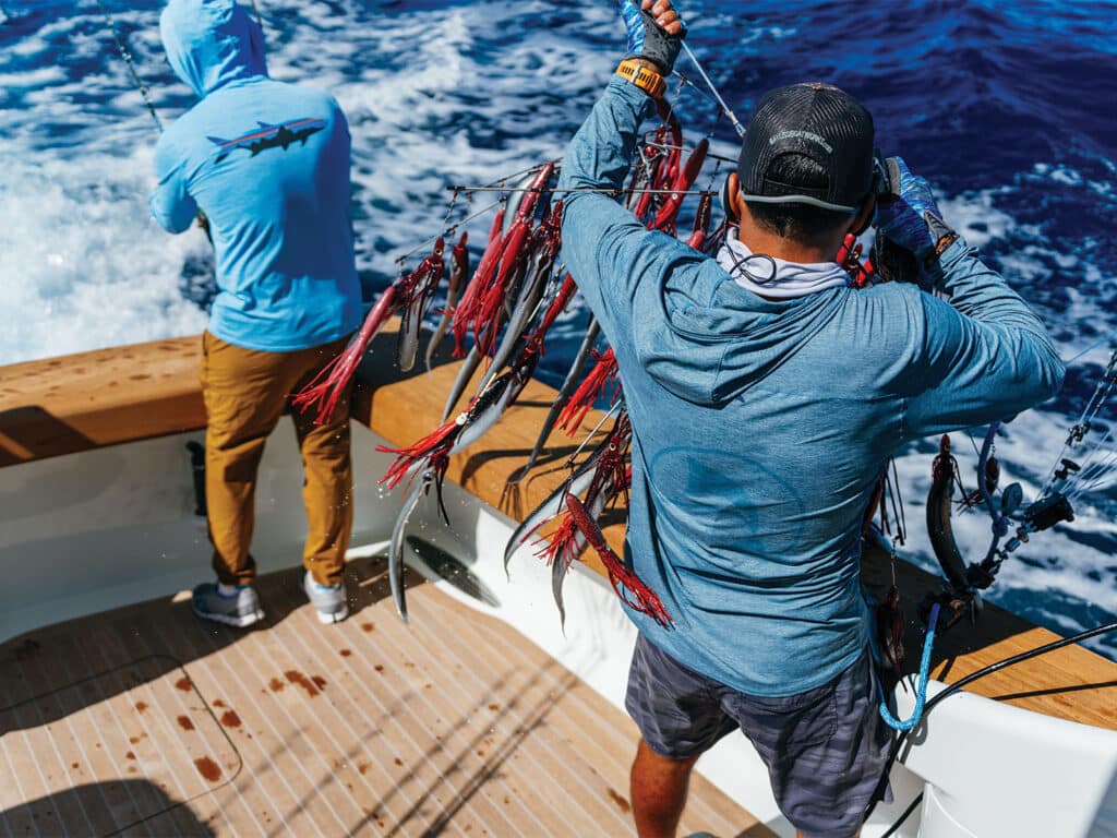 Anglers deploying a dredge rig.