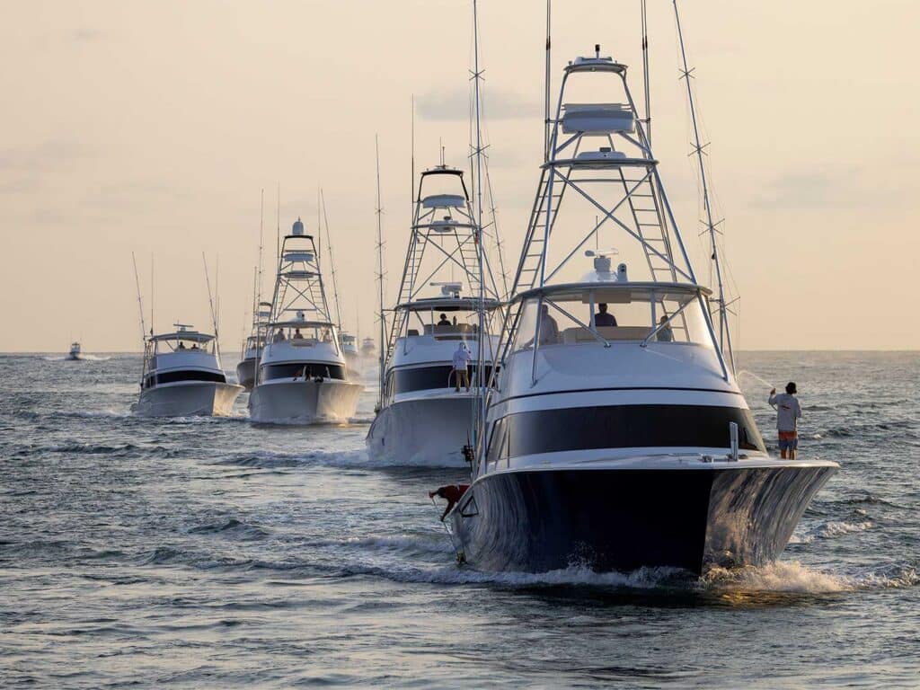 A fleet of sport-fishing boats on the water.